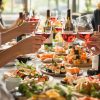 Friends enjoying sushi and South African wine in elegant setting